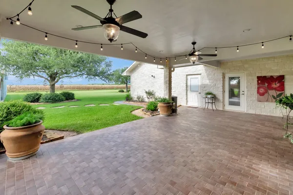 a view of a yard with an umbrella