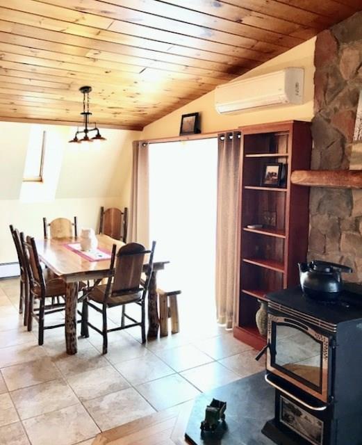 108 Covered Bridge Road Kenduskeag, ME 04450 - Photo 4 of 35 Open dining convenient to the deck...