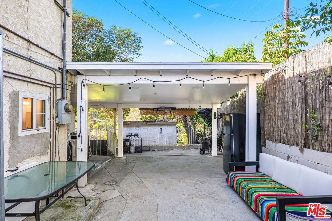 1969 Heidleman Road Los Angeles, CA 90032 - Photo 13 of 18 a living room filled with furniture and a table