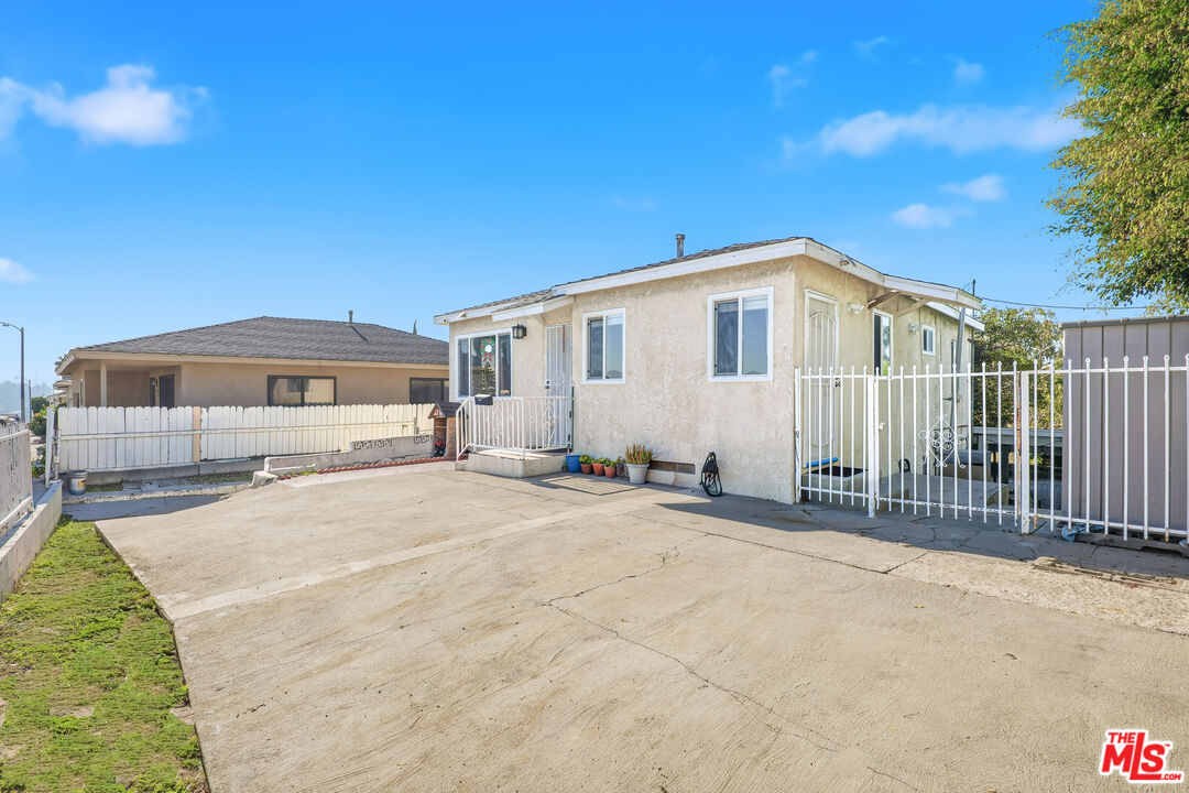 1969 Heidleman Road Los Angeles, CA 90032 - Photo 2 of 18 a front view of a house with a outdoor space