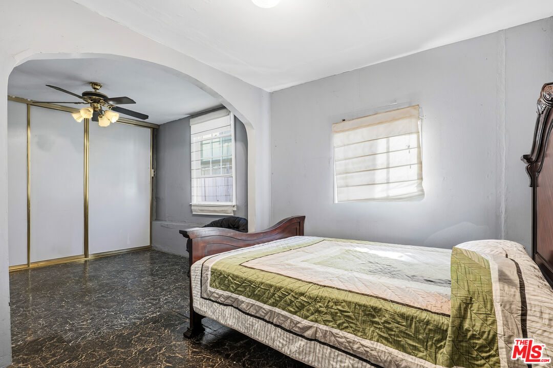 1969 Heidleman Road Los Angeles, CA 90032 - Photo 9 of 18 a bedroom with a bed and a window