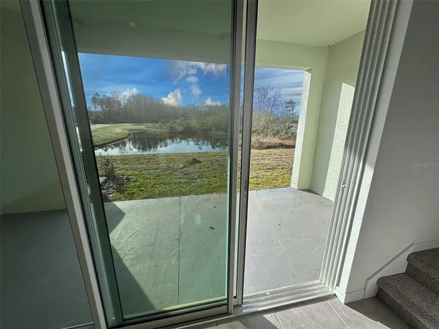 a white toilet sitting in a bathroom