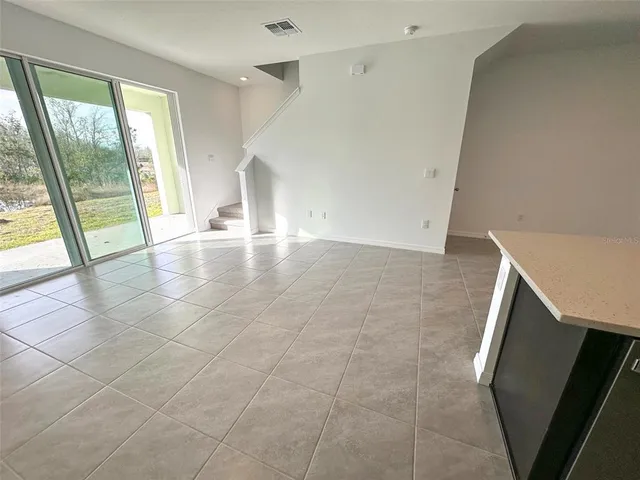 a bathroom with a shower and toilet