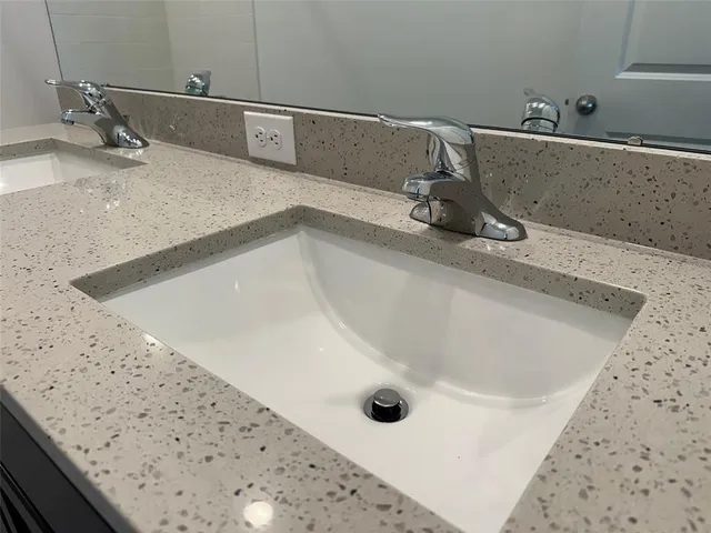 a bathroom with a sink and a toilet
