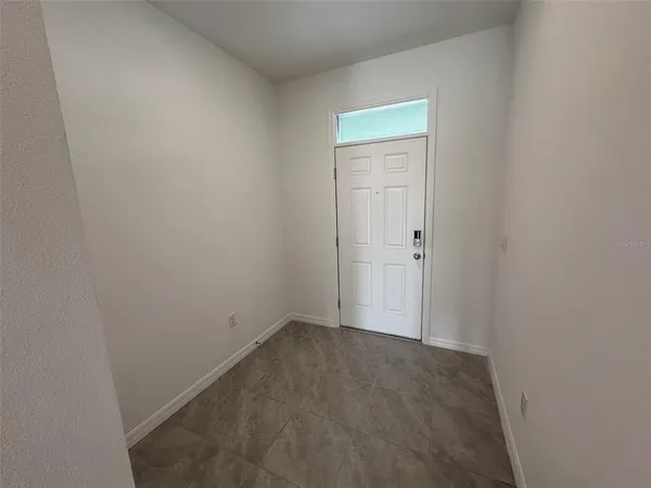 a kitchen with stainless steel appliances granite countertop a sink stove and microwave