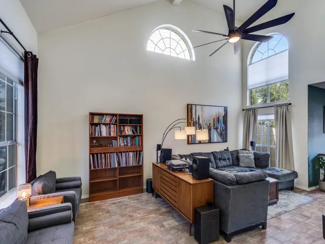 a living room with furniture and a window