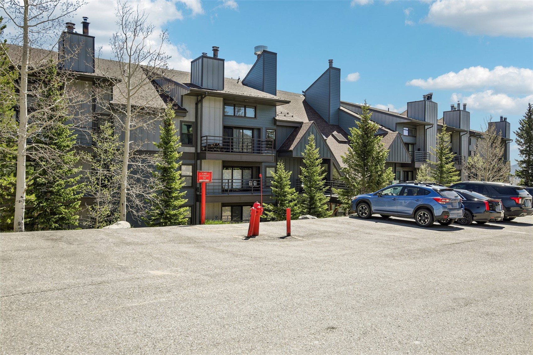 89310 Ryan Gulch Road, Unit 103 Silverthorne, CO 80498 - Photo 20 of 48 a view of a street with cars