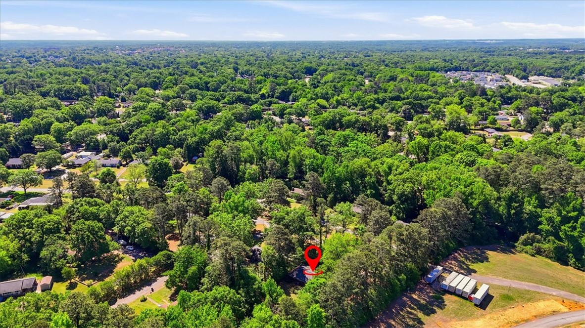 504 Jeb Stuart Avenue Anderson, SC 29621 - Photo 45 of 47 An aerial perspective showcases a vibrant, tree-filled landscape with scattered residences.