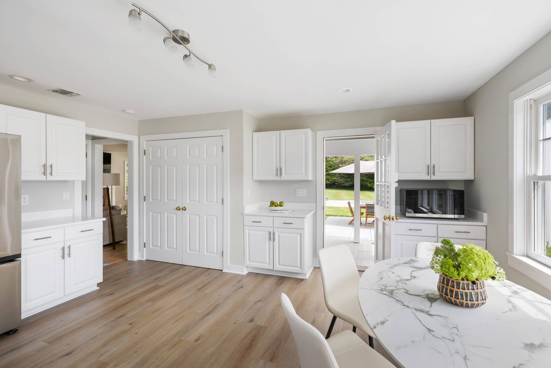 10 Aelfie's Way Bridgehampton, NY 11932 - Photo 15 of 31 a kitchen with a refrigerator and a stove top oven