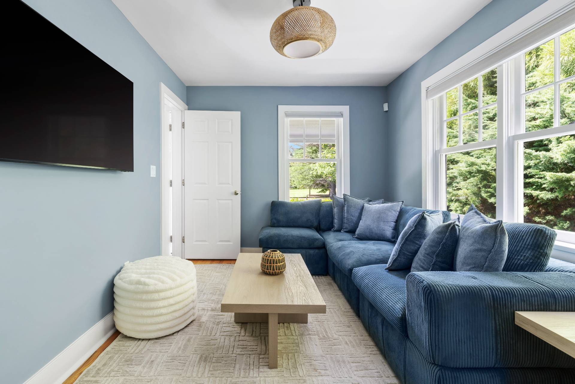 10 Aelfie's Way Bridgehampton, NY 11932 - Photo 17 of 31 a living room with furniture and a flat screen tv