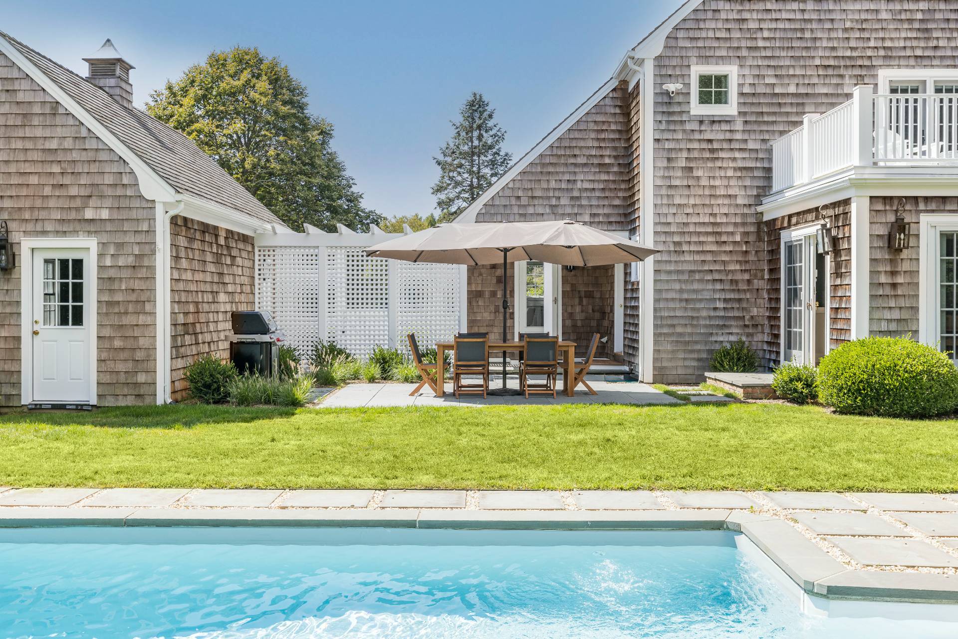 10 Aelfie's Way Bridgehampton, NY 11932 - Photo 2 of 31 a view of a house with a yard and sitting area