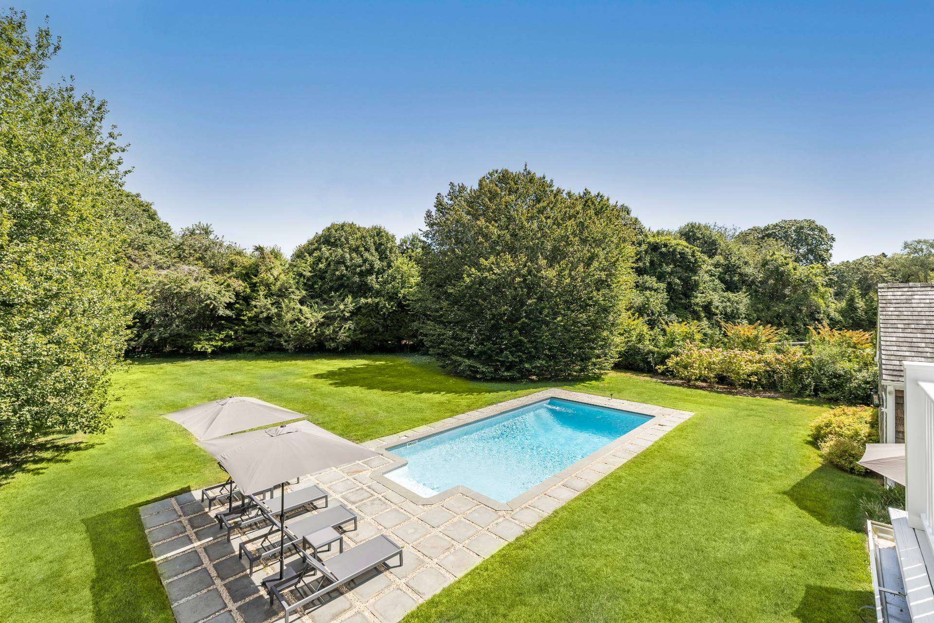 10 Aelfie's Way Bridgehampton, NY 11932 - Photo 23 of 31 a view of a backyard with swimming pool