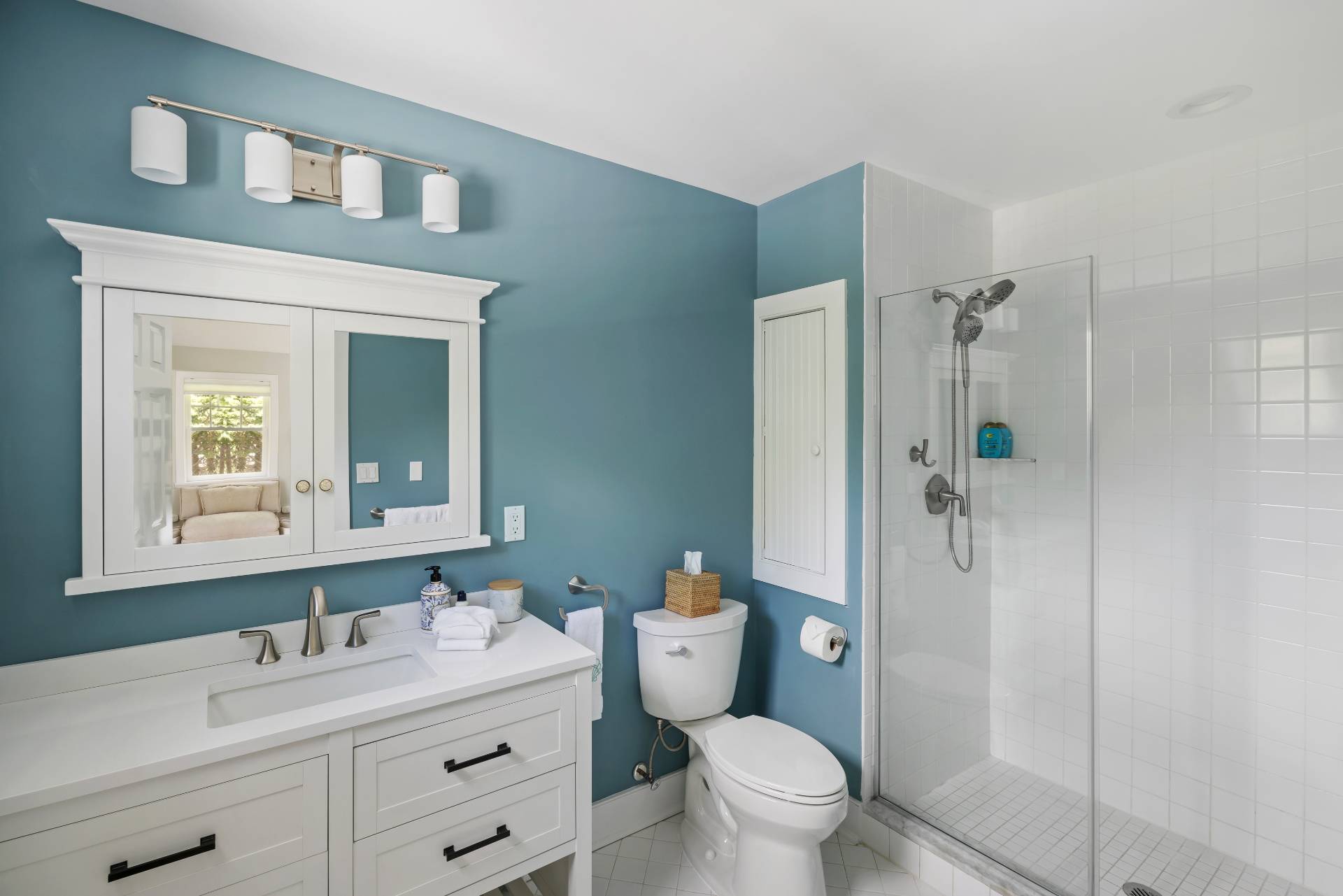 10 Aelfie's Way Bridgehampton, NY 11932 - Photo 24 of 31 a bathroom with a toilet a sink a mirror a shower and vanity