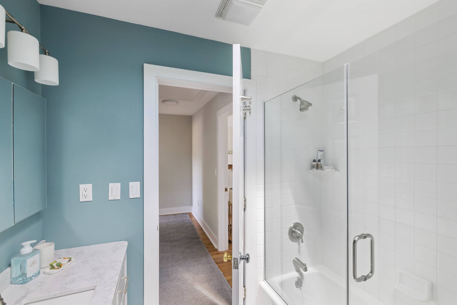 10 Aelfie's Way Bridgehampton, NY 11932 - Photo 27 of 31 a bathroom with a tub shower vanity and a sink