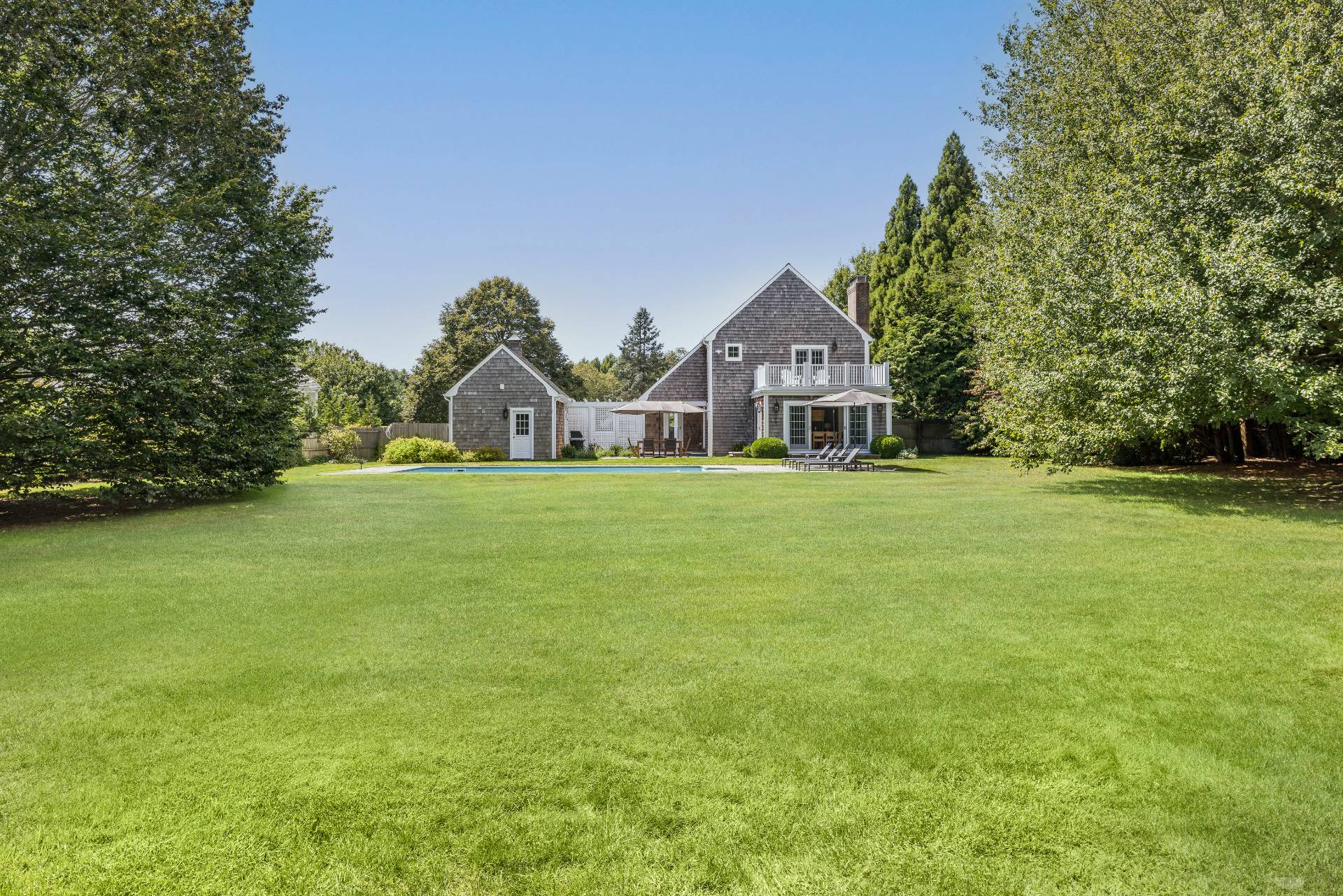 10 Aelfie's Way Bridgehampton, NY 11932 - Photo 8 of 31 a view of a house with a big yard and large trees