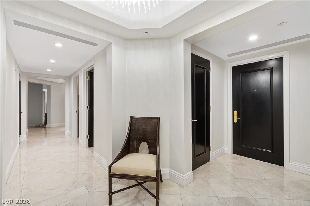2857 Paradise Road, Unit 602 Las Vegas, NV 89109 - Photo 30 of 33 Gleaming tile floors and clean architectural lines guide visitors through this welcoming entranceway.
