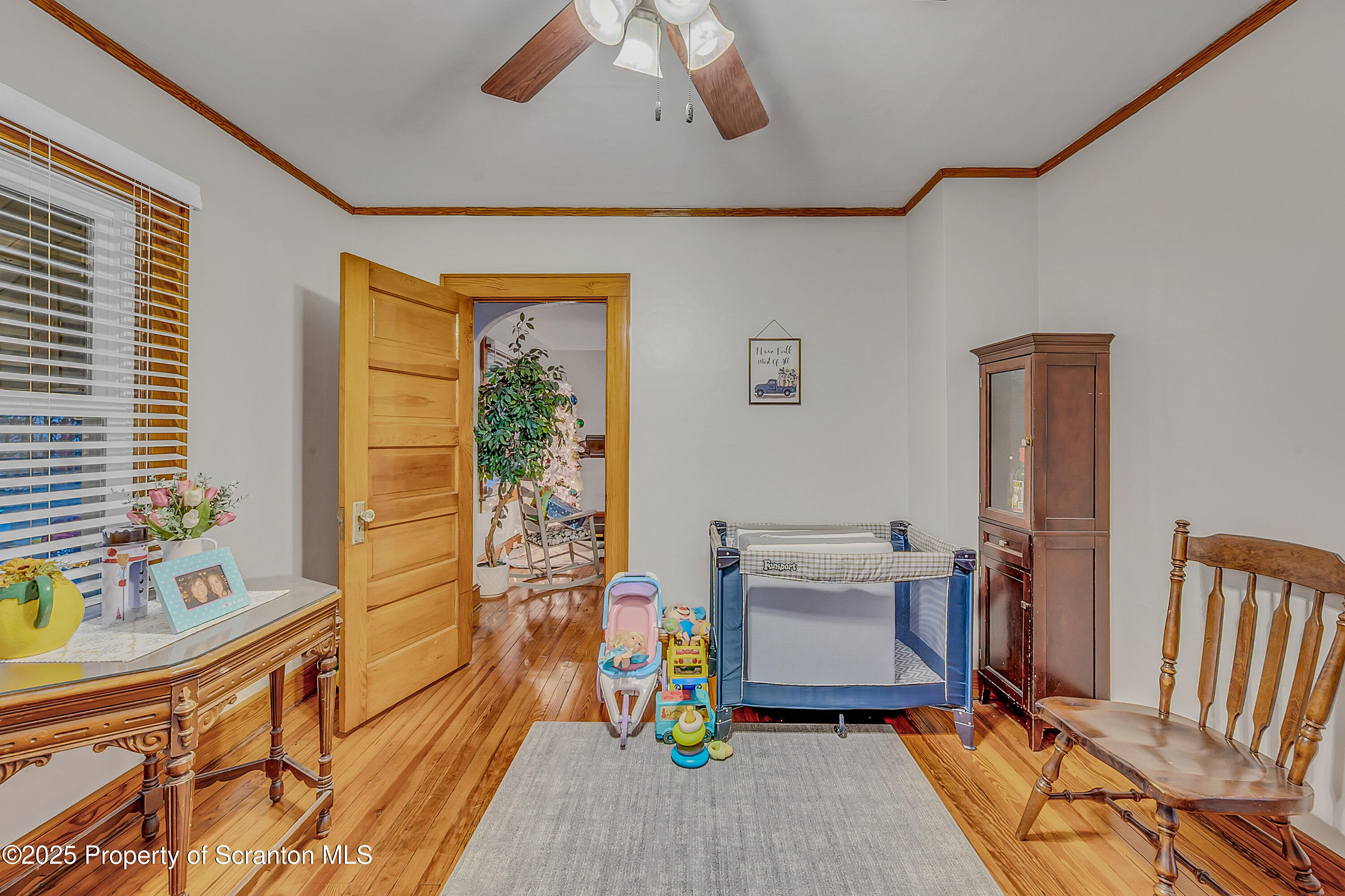191 Ash Street Archbald, PA 18403 - Photo 11 of 28 a living room with a couch and a dining table