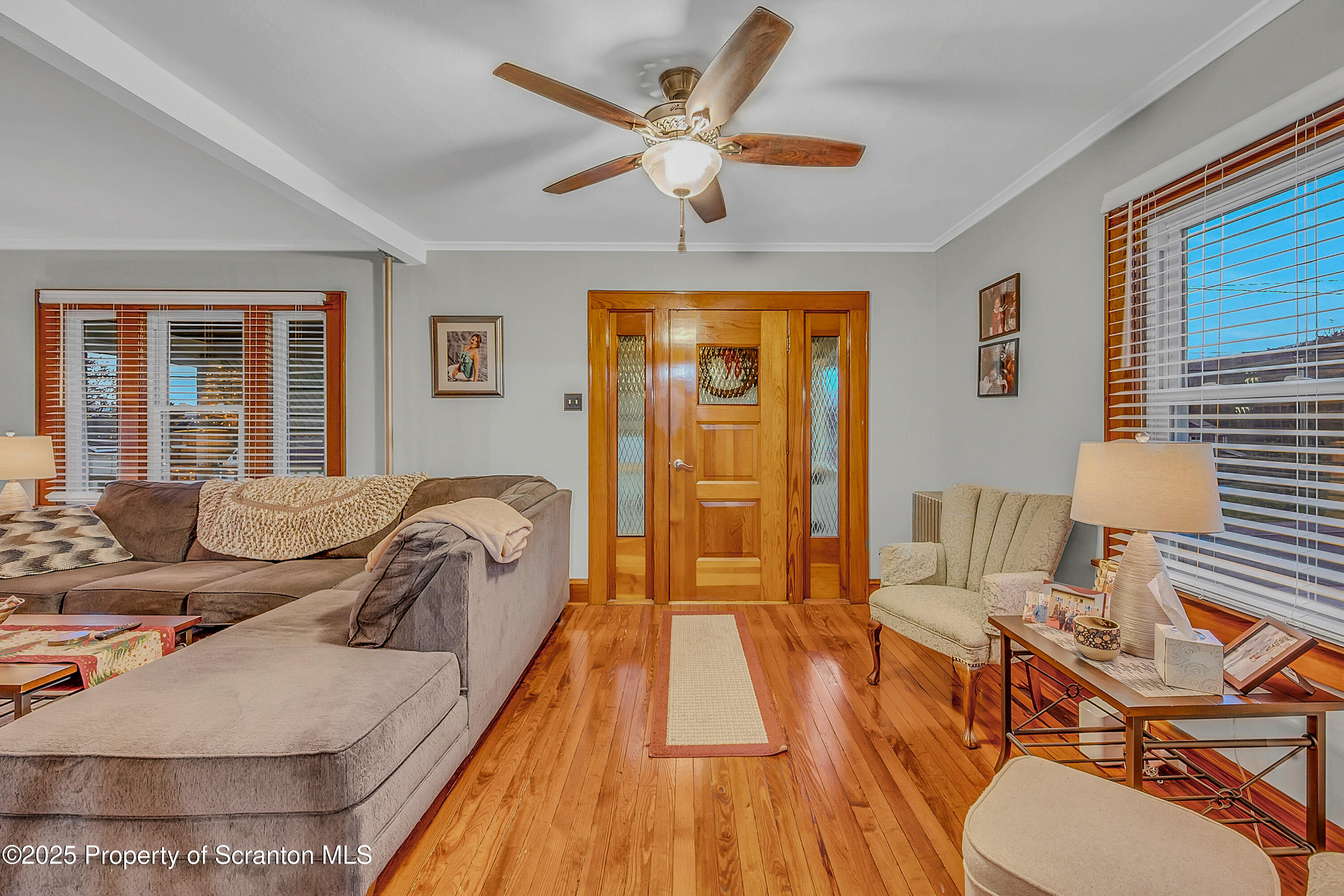 191 Ash Street Archbald, PA 18403 - Photo 4 of 28 a spacious bedroom with a bed and glass table