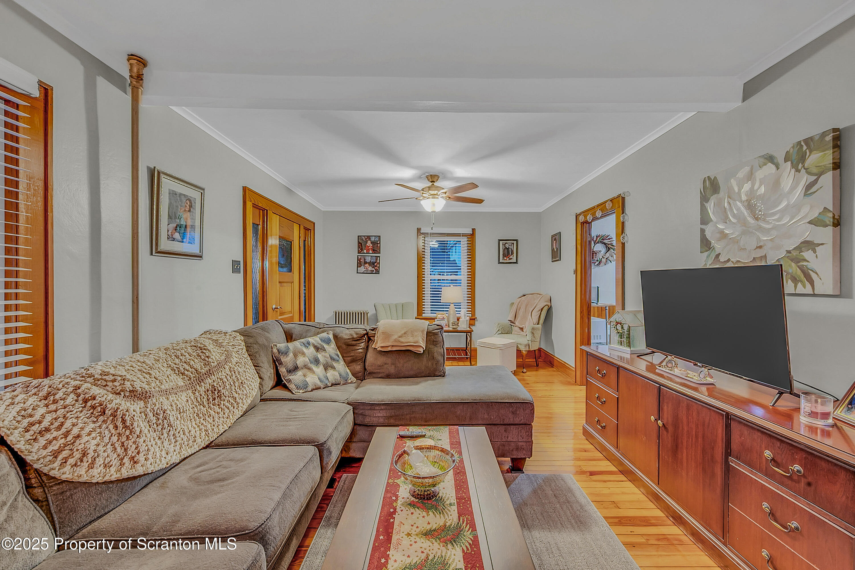 191 Ash Street Archbald, PA 18403 - Photo 5 of 28 a living room with furniture and a flat screen tv