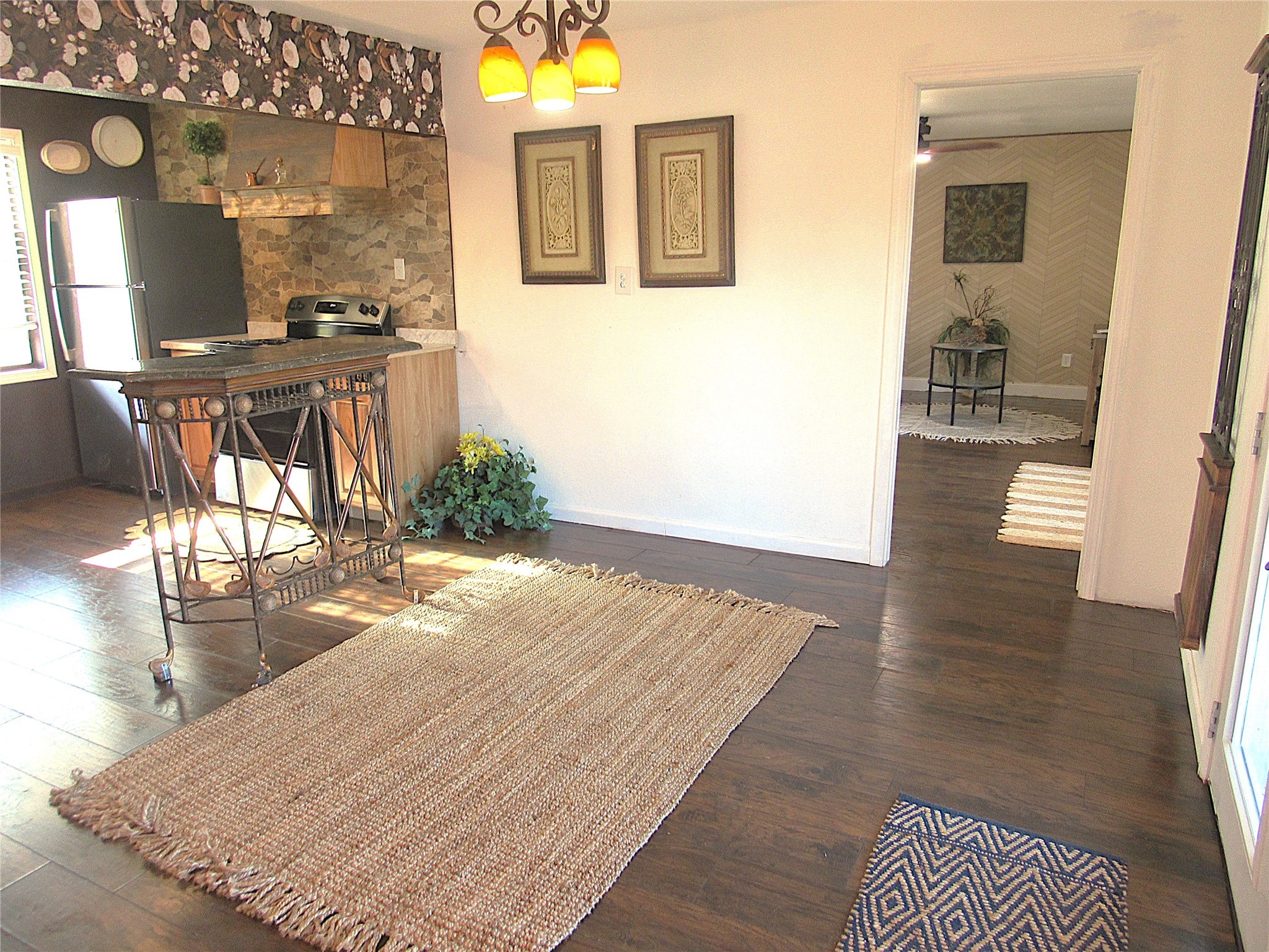 2503 River Crest Houston, TX 77338 - Photo 23 of 35 a view of a hallway and wooden floor with an entryway