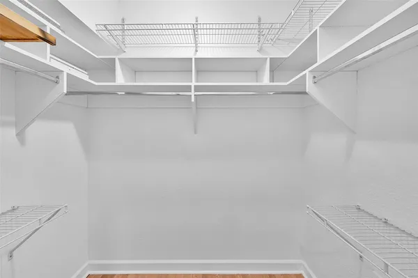 a view of an empty walk in closet