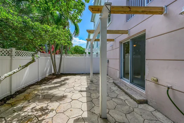a view of a garage and car parked