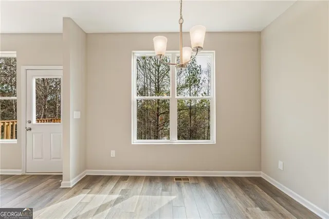 a view of a kitchen with a sink and an oven