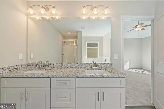 a white bath tub sitting next to a window
