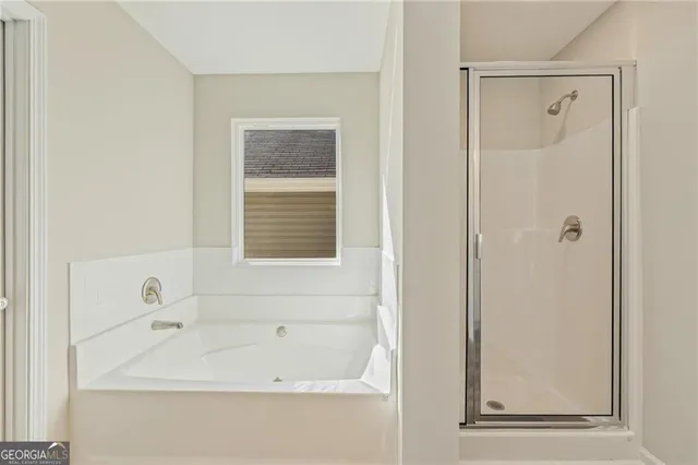 a view of an empty room with a sliding door