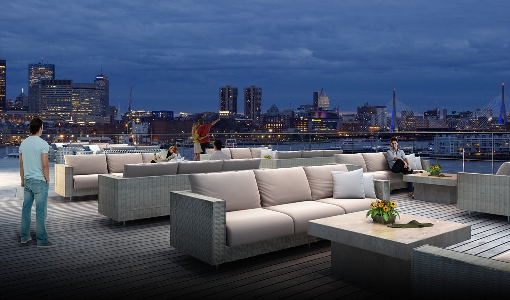 a living room with furniture and a city view