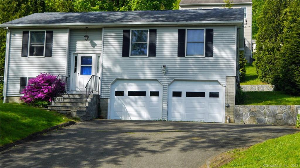 a front view of house with yard