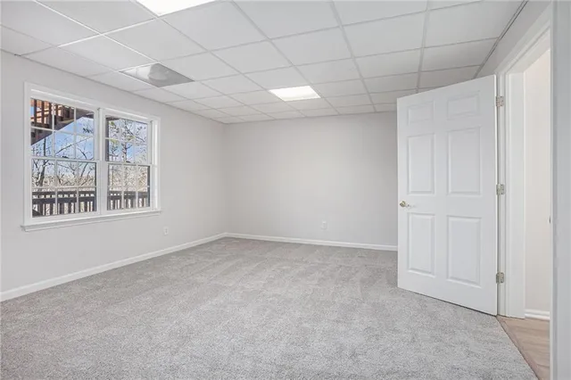 an empty room with windows