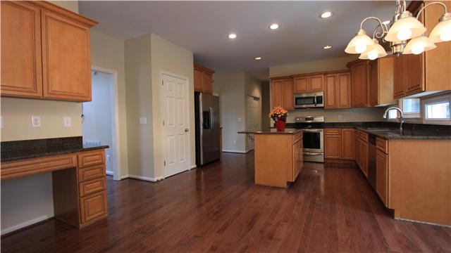 629 Rutherford Lane Franklin, TN 37064 - Photo 11 of 20 Large eat in kitchen completely updated, large island, great views of backyard.
