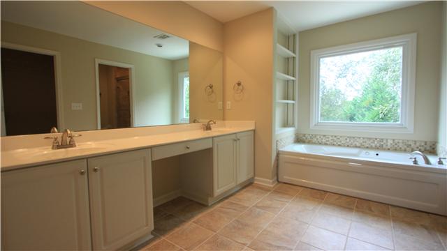 629 Rutherford Lane Franklin, TN 37064 - Photo 16 of 20 Updated master bath with double vanities and garden tub, with great views of back yard.