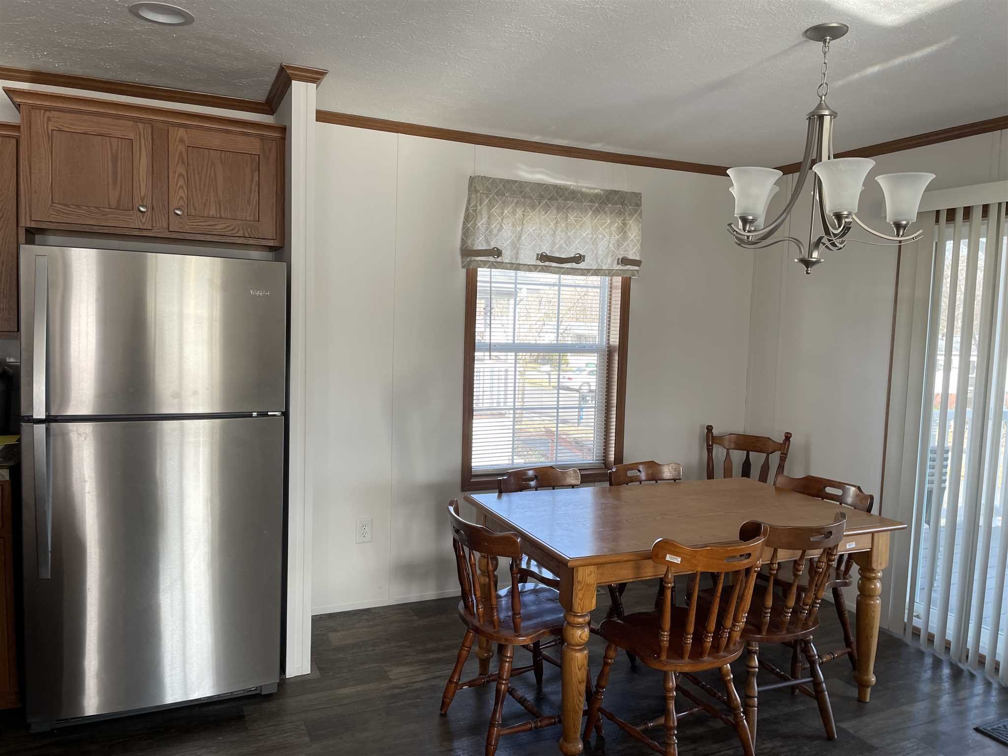32 Scribo Lane Wappingers Falls, NY 12590 - Photo 5 of 16 a view of a dining room with furniture window and wooden floor