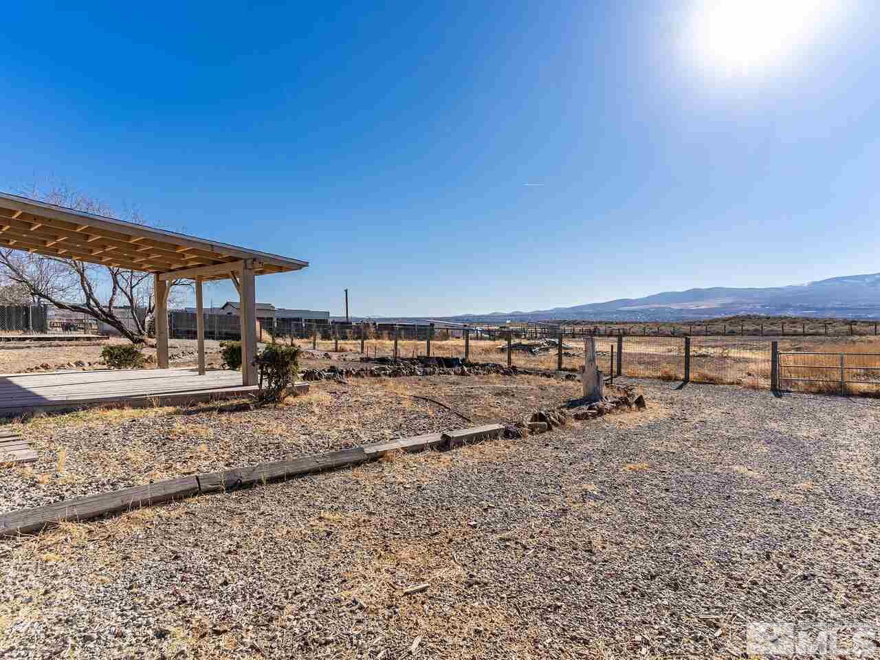 8400 Osage Road Reno, NV 89508 - Photo 20 of 28 a view of a large building with swimming pool in front of it