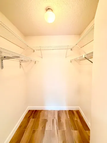 a view of a room with racks on the wall