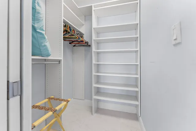 a view of a city from a dining room with large windows