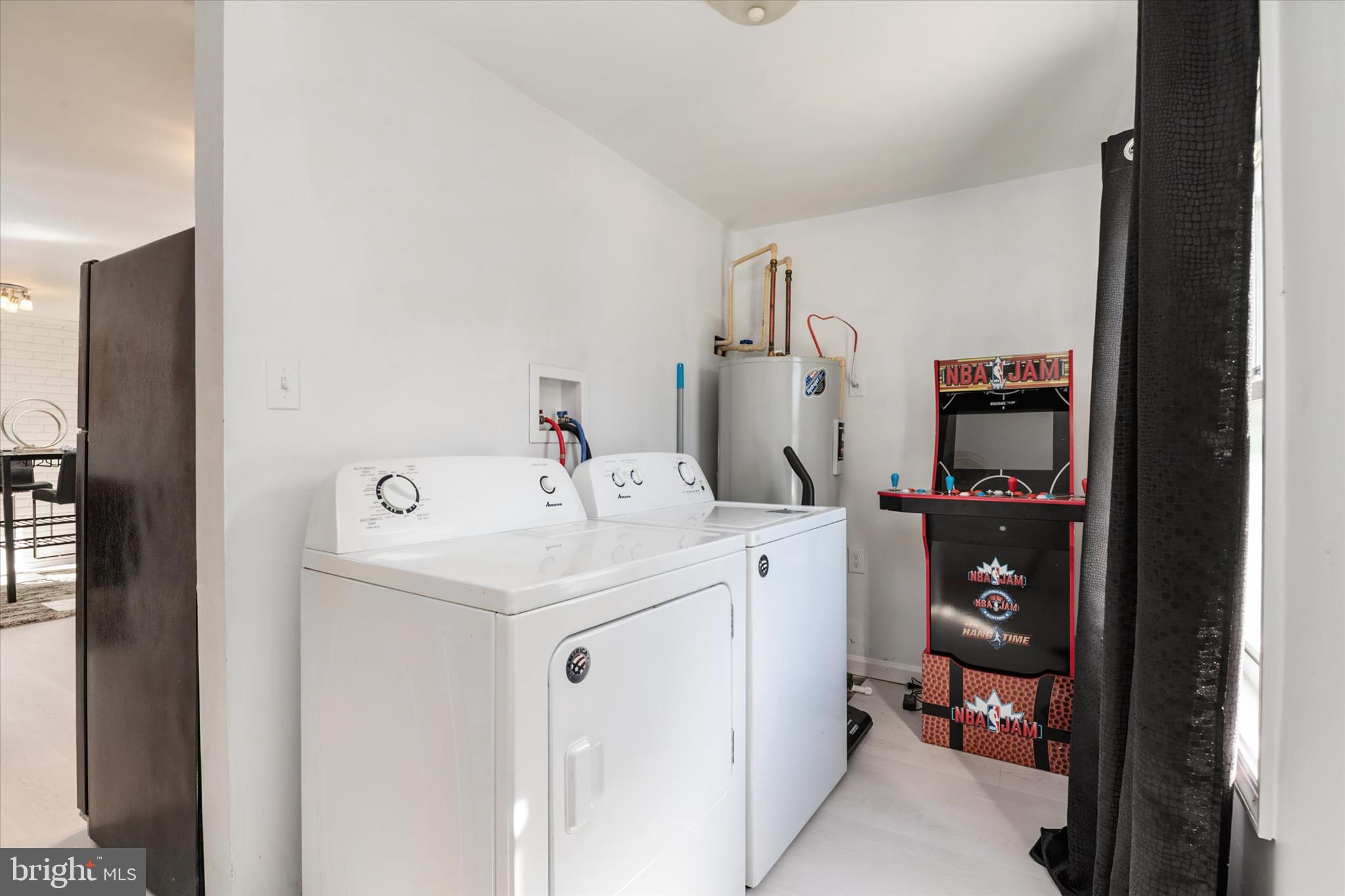 108 Wilson Road Grasonville, MD 21658 - Photo 10 of 38 a utility room with dryer and washer