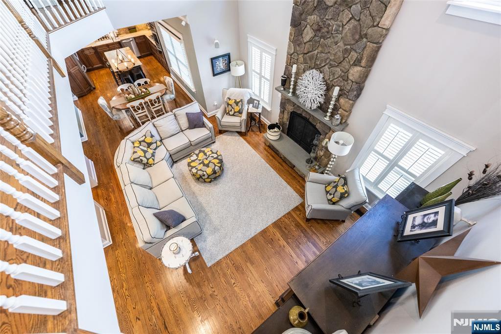 44 Forest Terrace Wayne, NJ 07470 - Photo 11 of 32 an aerial view of a fireplace with wooden floor