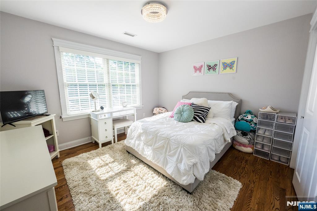 44 Forest Terrace Wayne, NJ 07470 - Photo 26 of 32 a bedroom with a bed and a window