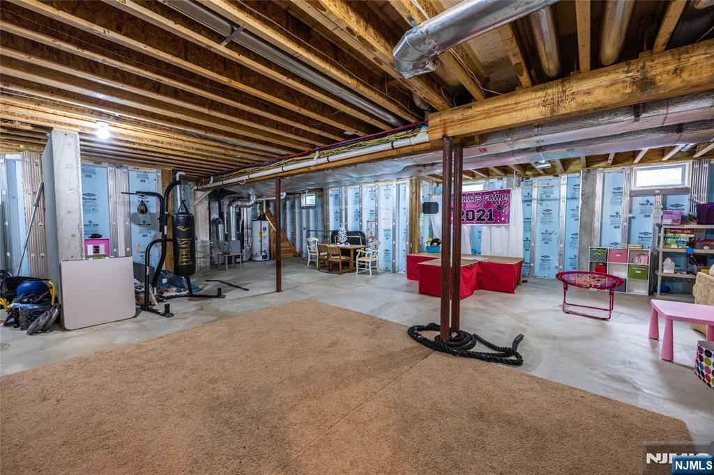 44 Forest Terrace Wayne, NJ 07470 - Photo 29 of 32 a view of a room with gym equipment