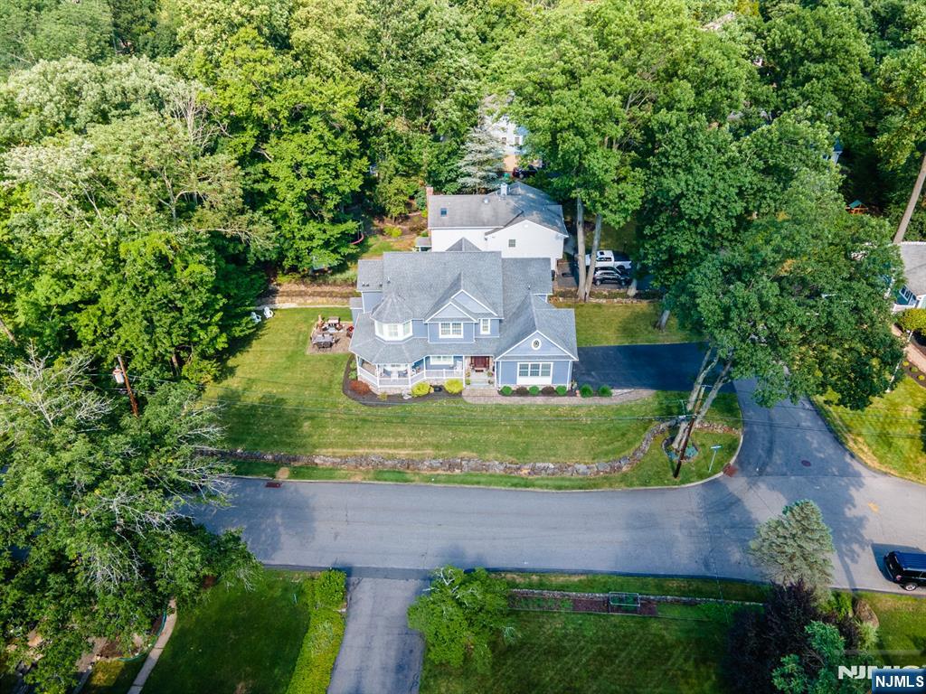 44 Forest Terrace Wayne, NJ 07470 - Photo 3 of 32 an aerial view of a house with a yard and a fountain
