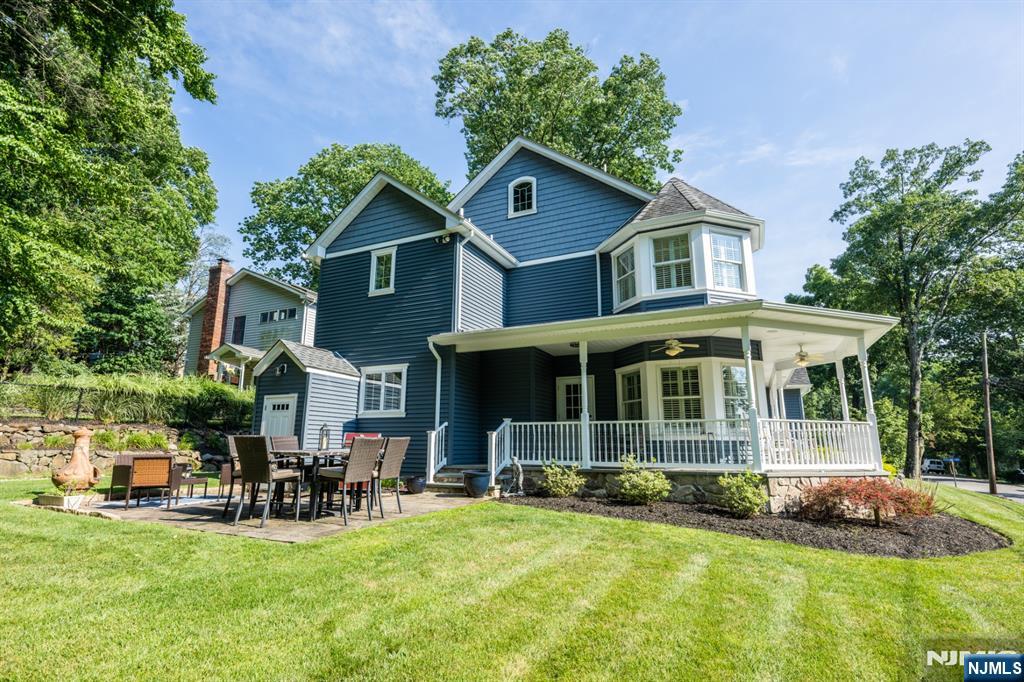 44 Forest Terrace Wayne, NJ 07470 - Photo 31 of 32 a front view of a house with yard porch and furniture