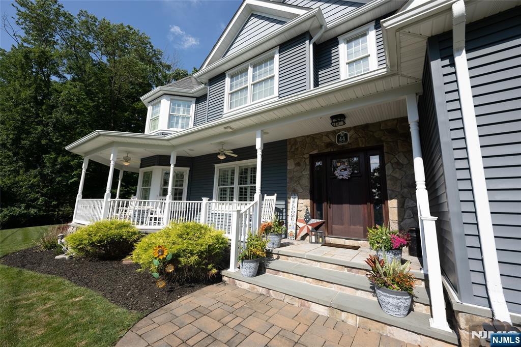 44 Forest Terrace Wayne, NJ 07470 - Photo 5 of 32 a house view with a sitting space and garden space