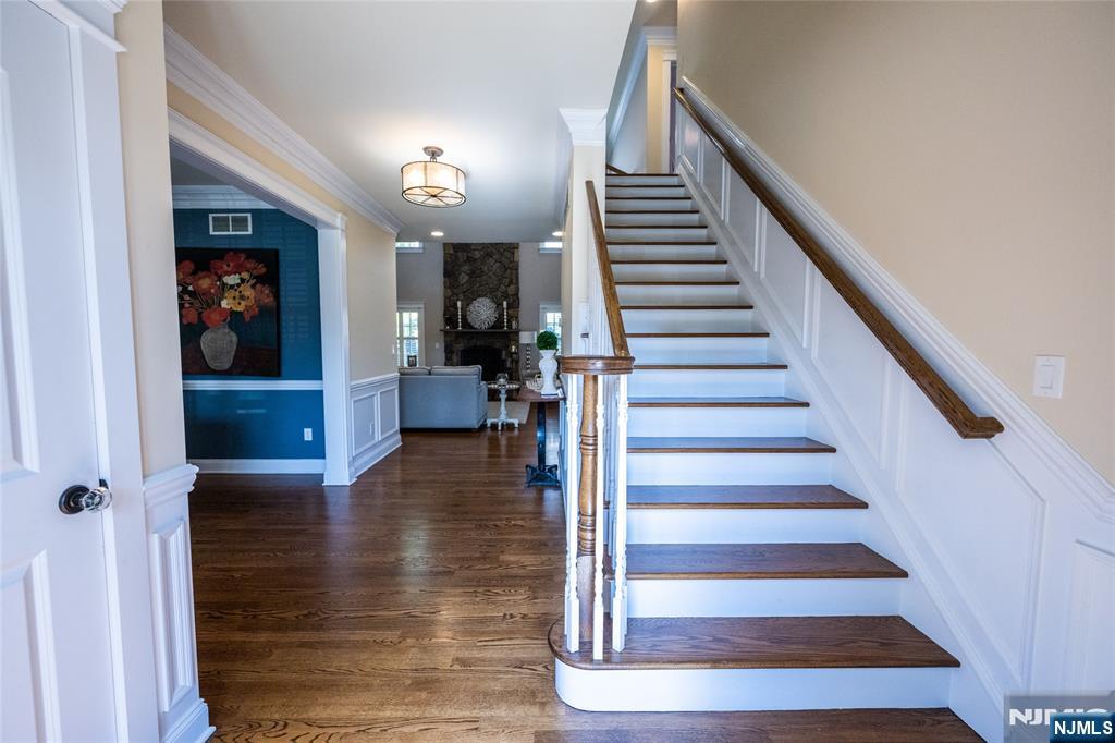 44 Forest Terrace Wayne, NJ 07470 - Photo 6 of 32 a view of entryway and hall with wooden floor