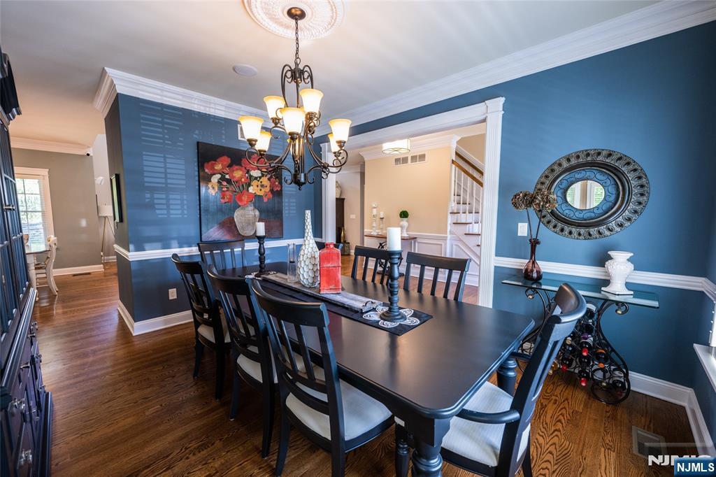 44 Forest Terrace Wayne, NJ 07470 - Photo 8 of 32 a view of a dining room with furniture and chandelier