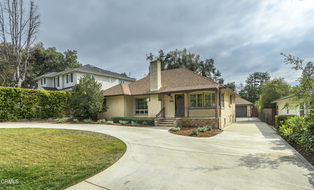 4630 Alveo Road La Canada Flintridge, CA 91011 - Photo 1 of 1 a front view of a house with a yard