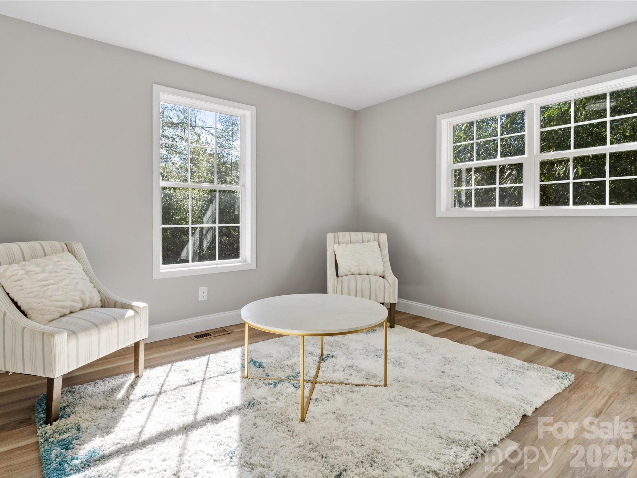 105 South York Street Lancaster, SC 29720 - Photo 16 of 28 a living room with furniture and a window