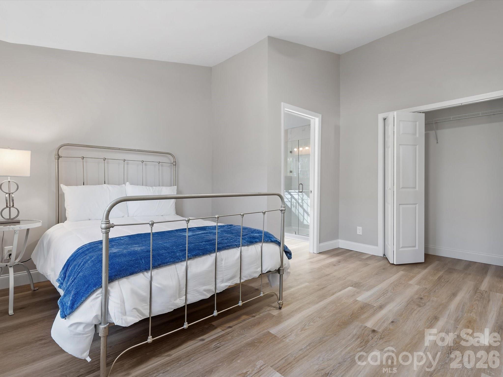 105 South York Street Lancaster, SC 29720 - Photo 19 of 28 a bedroom with a bed and a night stand